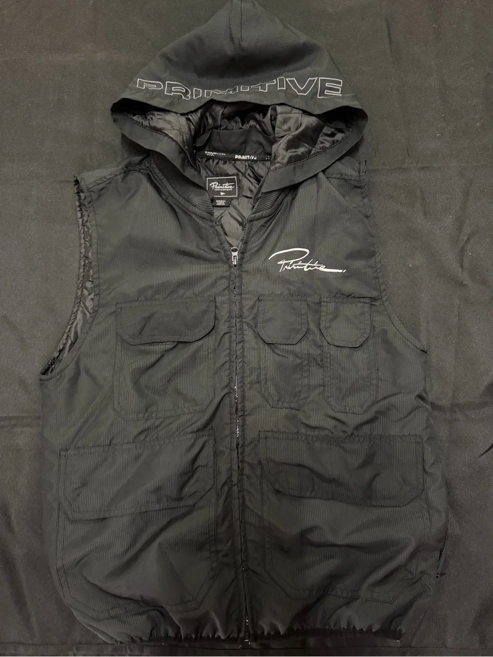 Primitive Black Hooded Utility Vest with Chest Logo